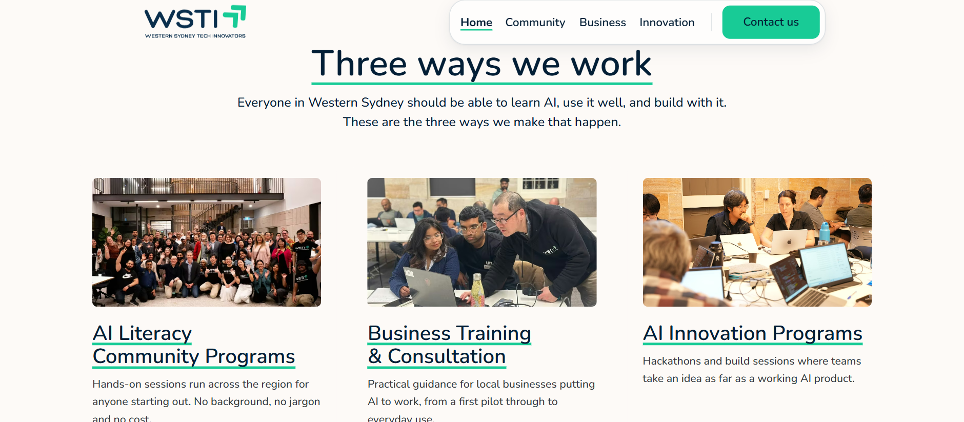 WSTI homepage section “Three ways we work” with photo cards for AI Literacy Community Programs, Business Training & Consultation, and AI Innovation Programs